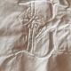 Old large monogrammed sheet hand-embroidered.