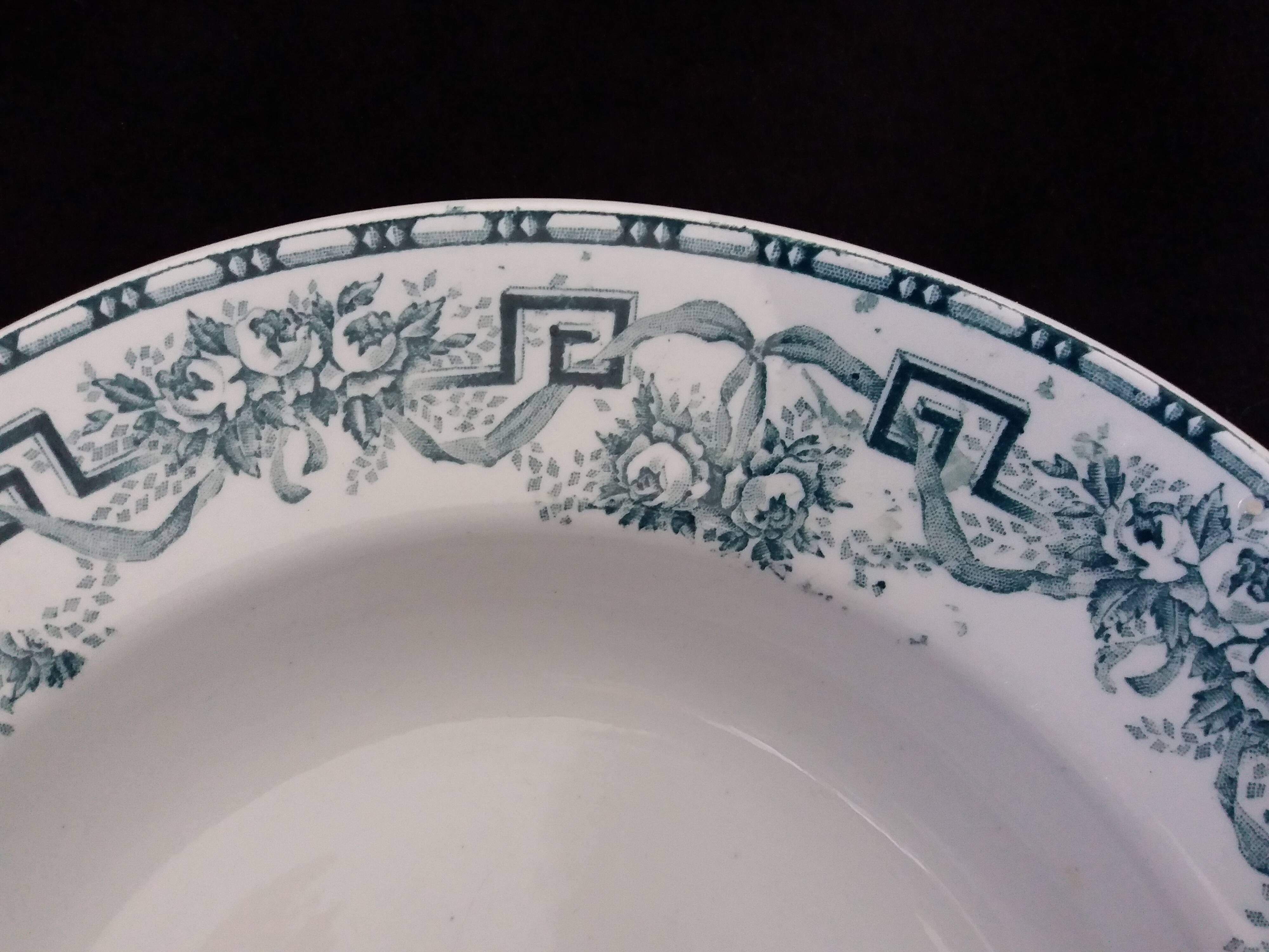 Old green and blue mismatched plates from Digoin, Salins, Moulin des Loups