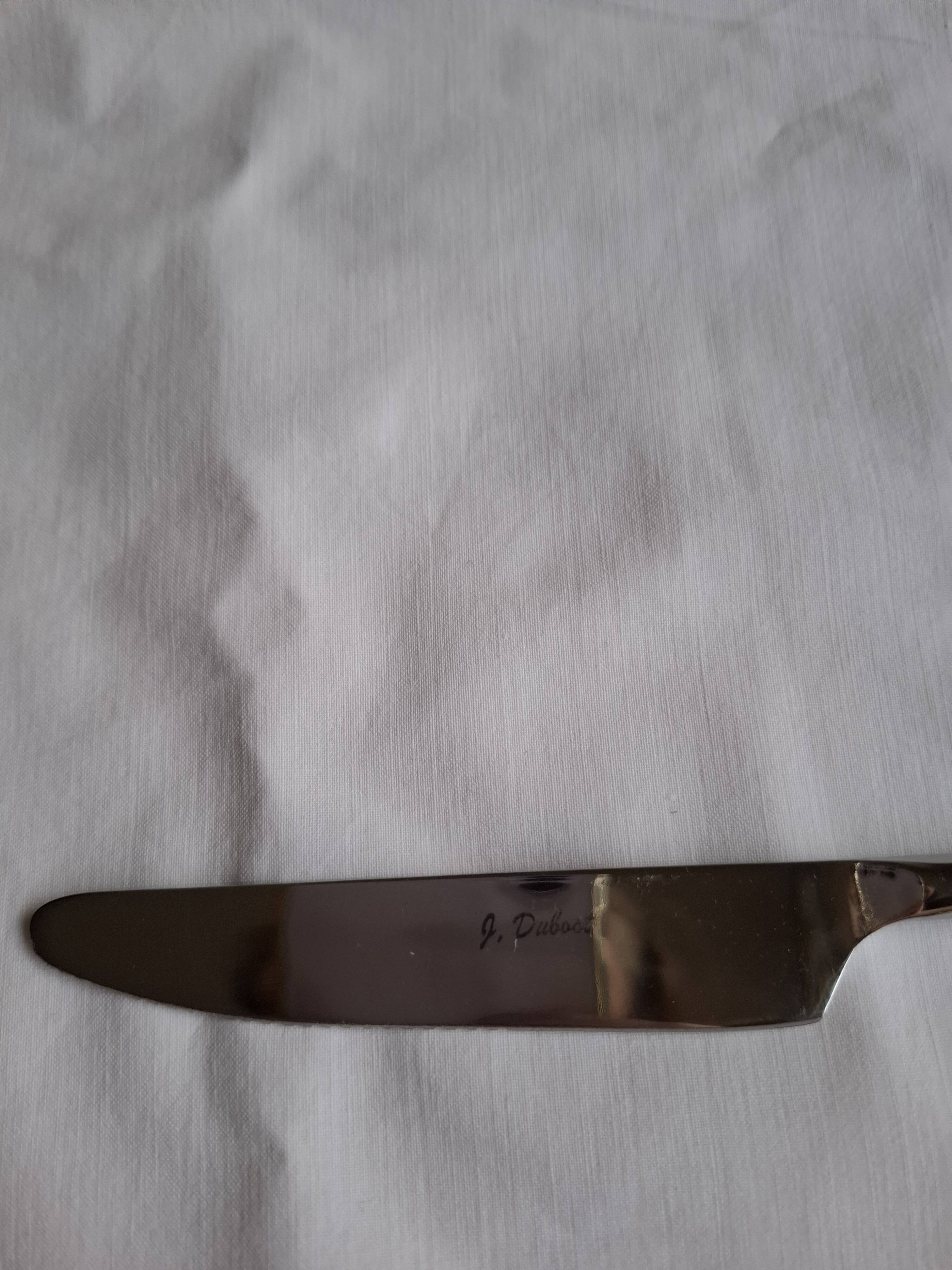 Twisted metal cutlery with a fancy spiral design.