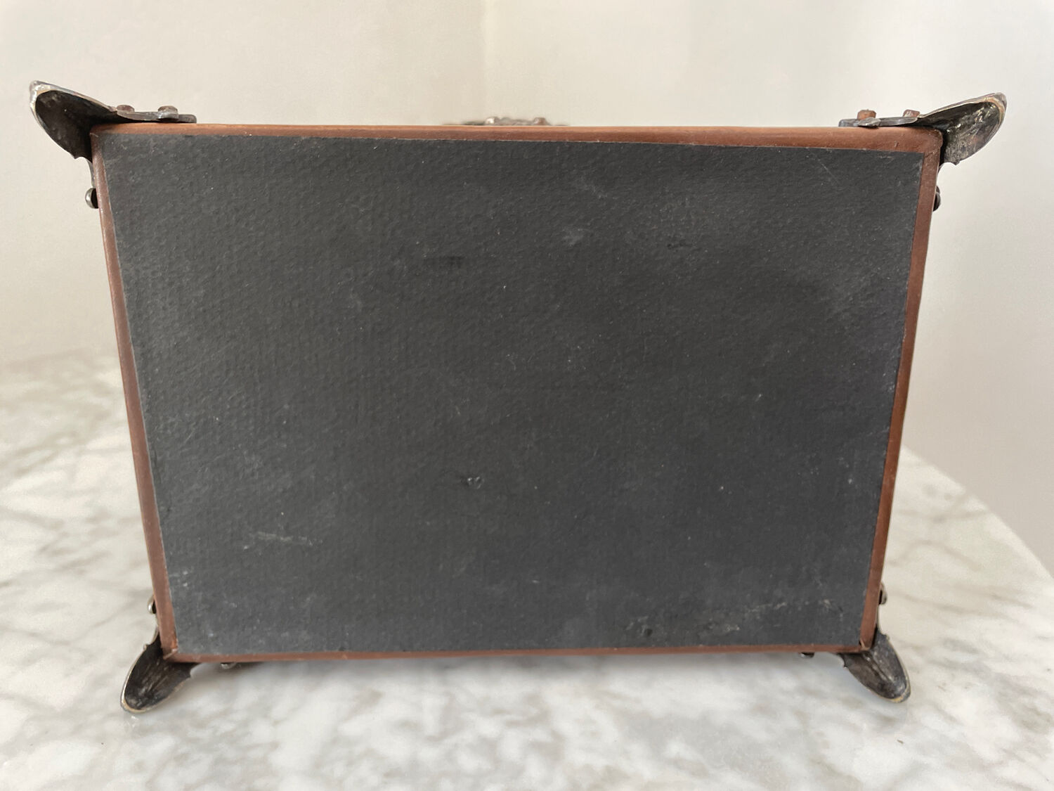 Vintage leather and silver metal jewelry box.