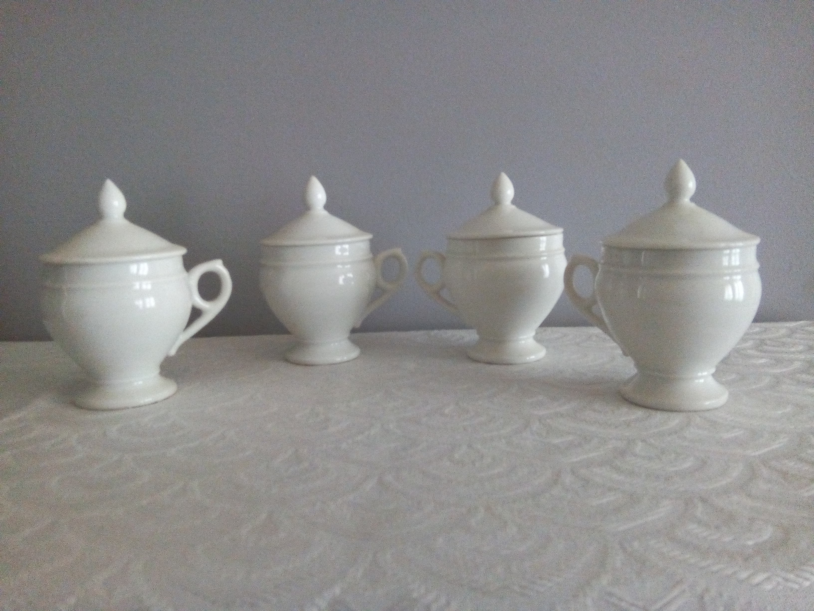 4 Porcelain cream jars