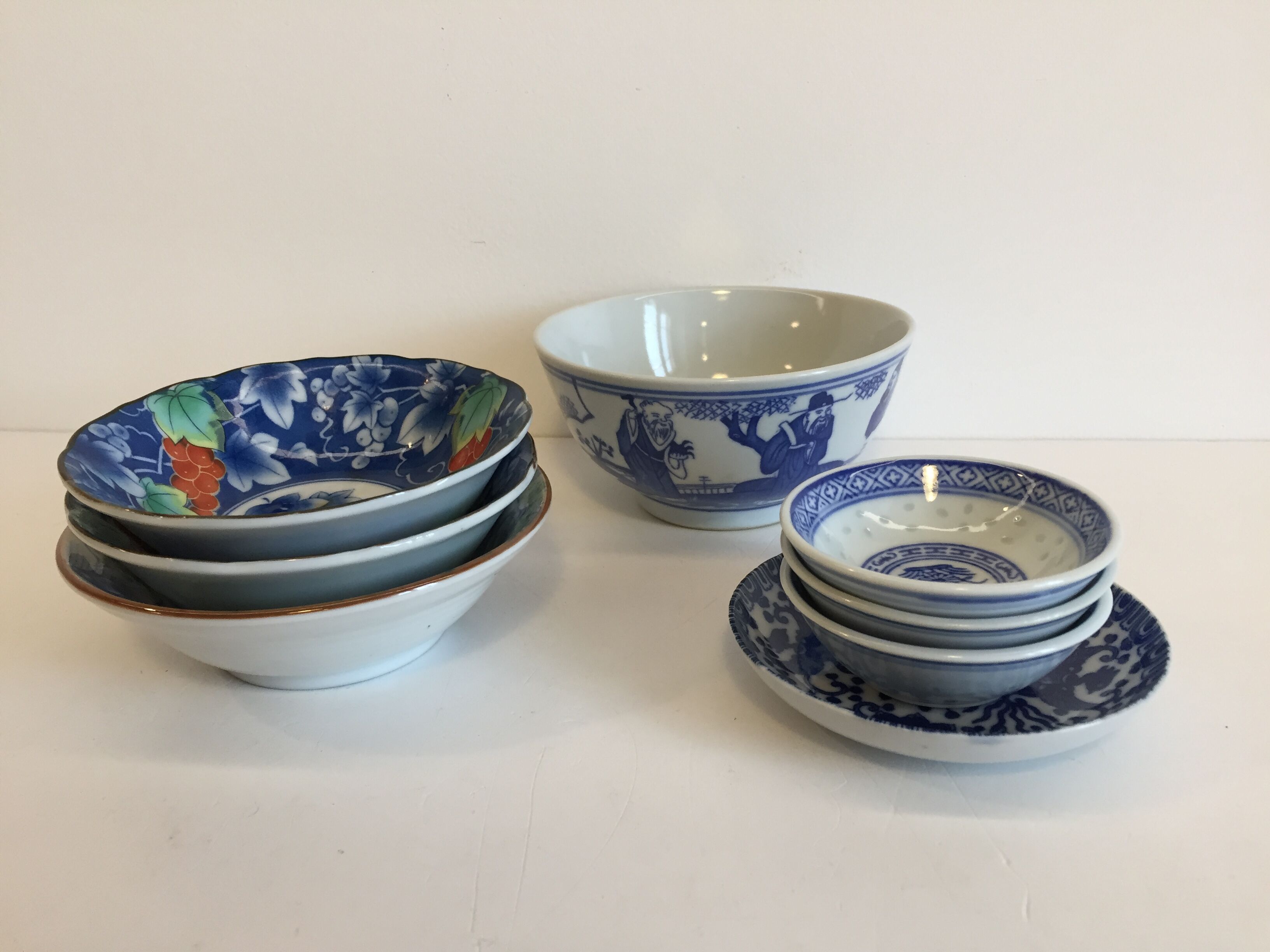 set of 4 bowls and 4 asian porcelain cups