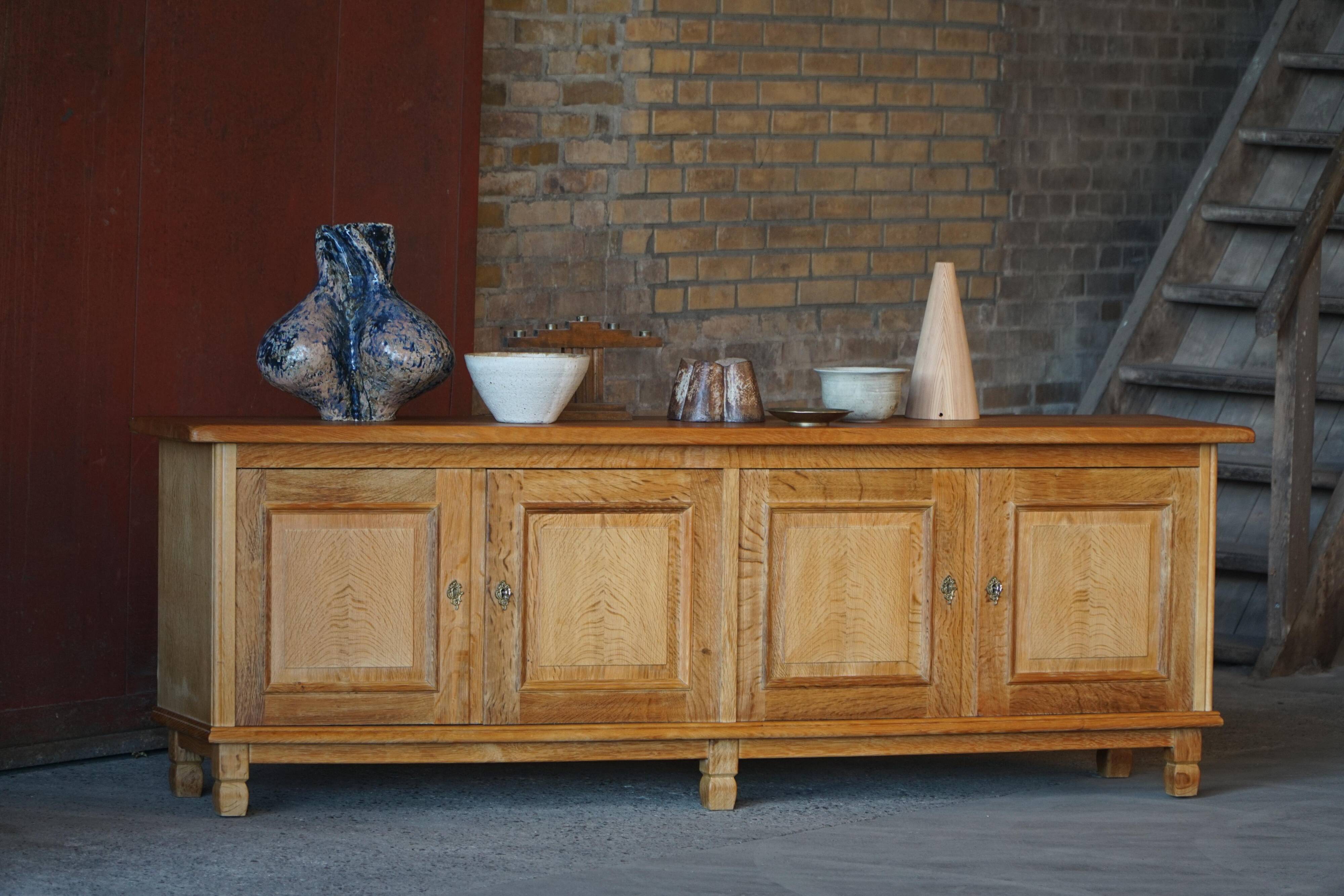 Modern Danish low enfilade in oak with panelled doors, mid-20th century.