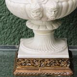 Pair of Medicis Borghese vases in porcelain biscuit and brass.