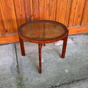 Vintage Art Deco round side table with cane top and walnut wooden frame, 1930s