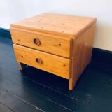 Bedside table assigned to Charlotte Perriand for Les Arcs, in pine, circa 1960.