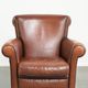 Timeless armchair made of sheepskin leather with a English look