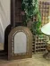Miroir ancien doré à décor sculpté de style ethnique