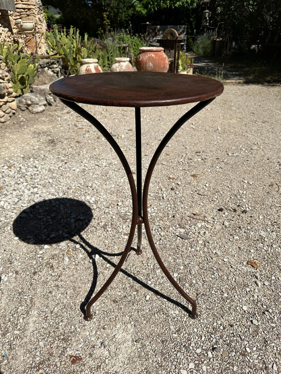Artisanal wrought iron side table