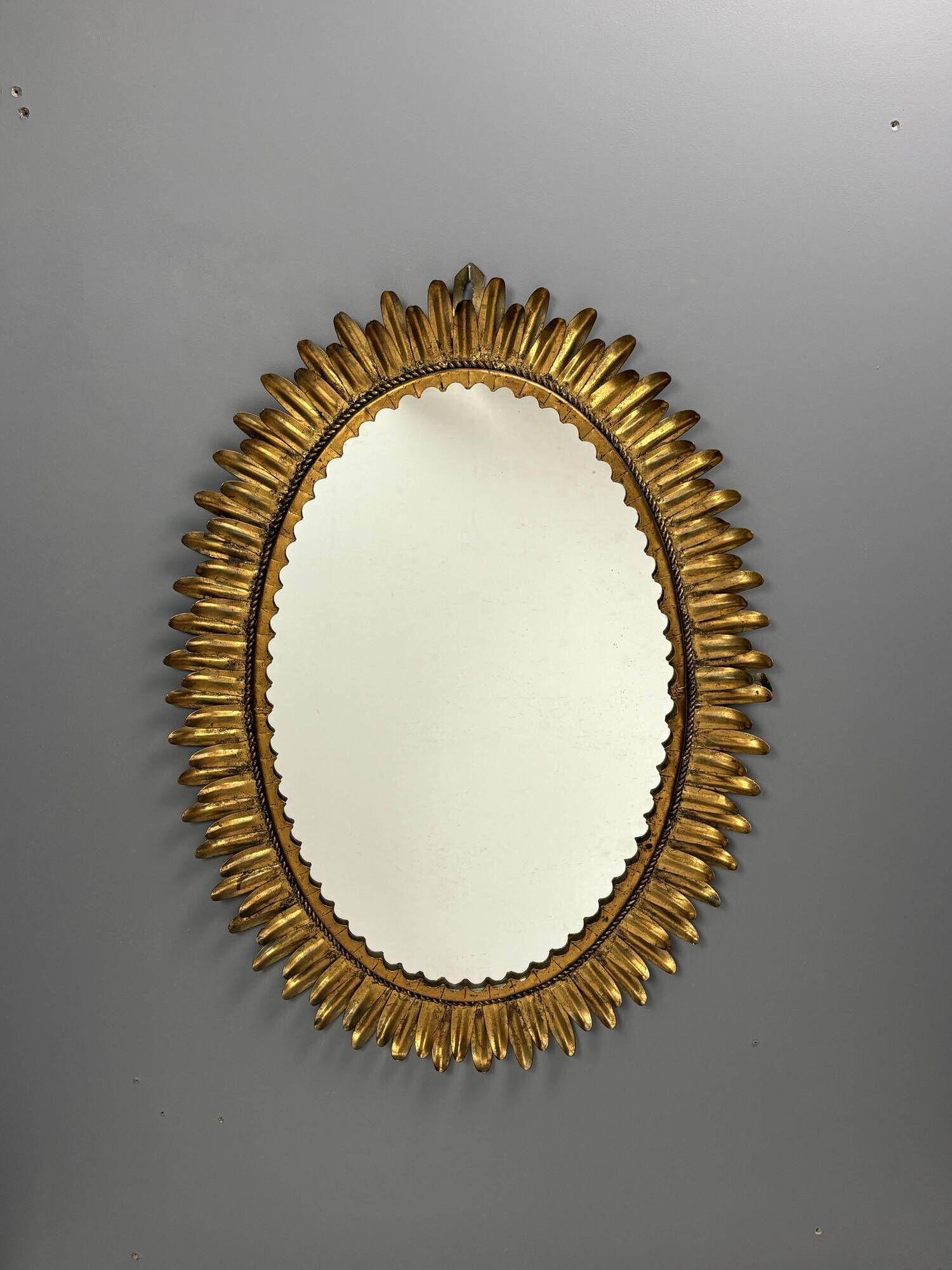 Midcentury bohemian Hollywood Regency Spanish gilt metal sun mirror, 1960s