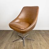 1970s swivel chair with faux leather shell and chrome.