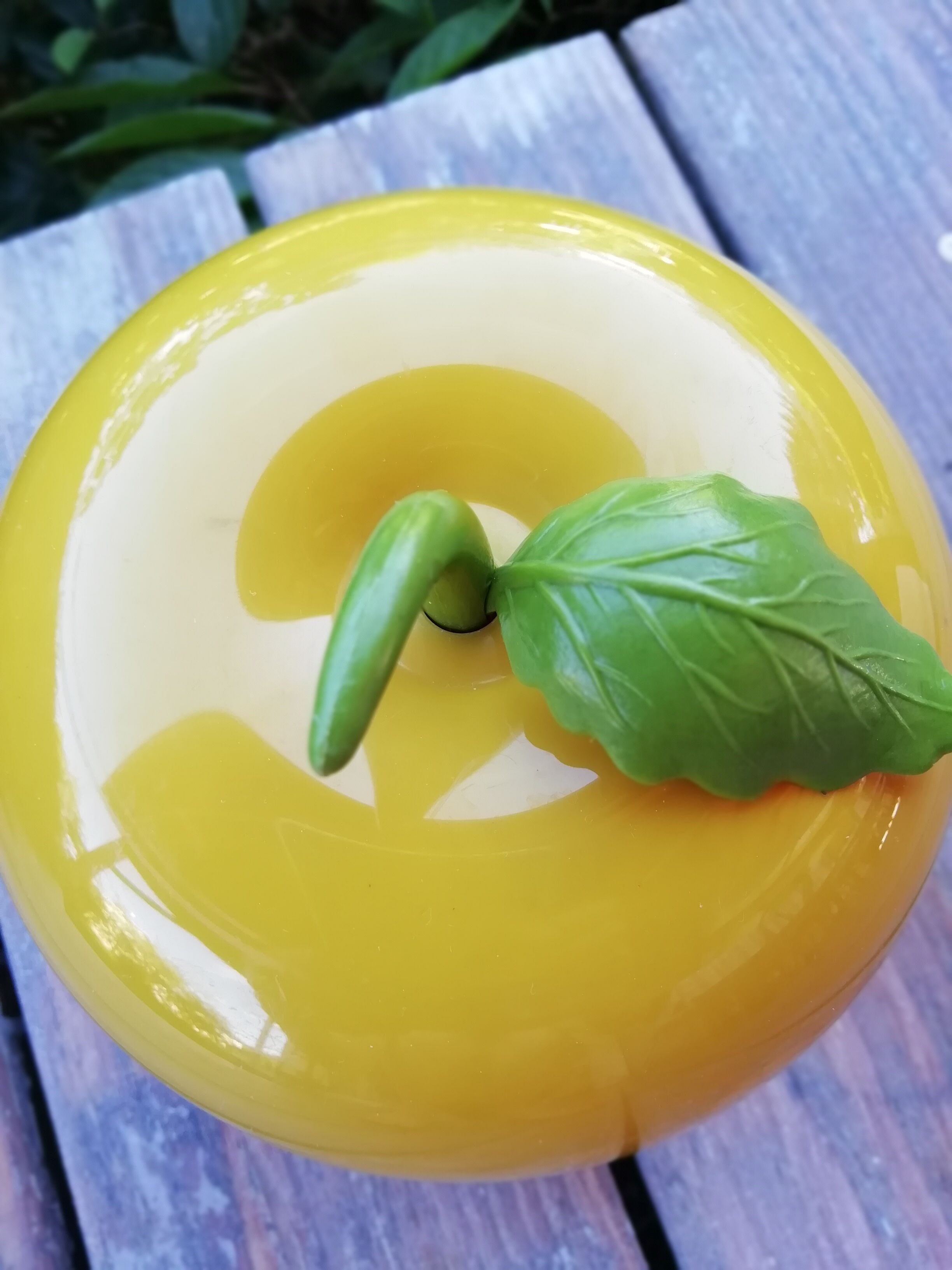 Mustard yellow ice cube apple