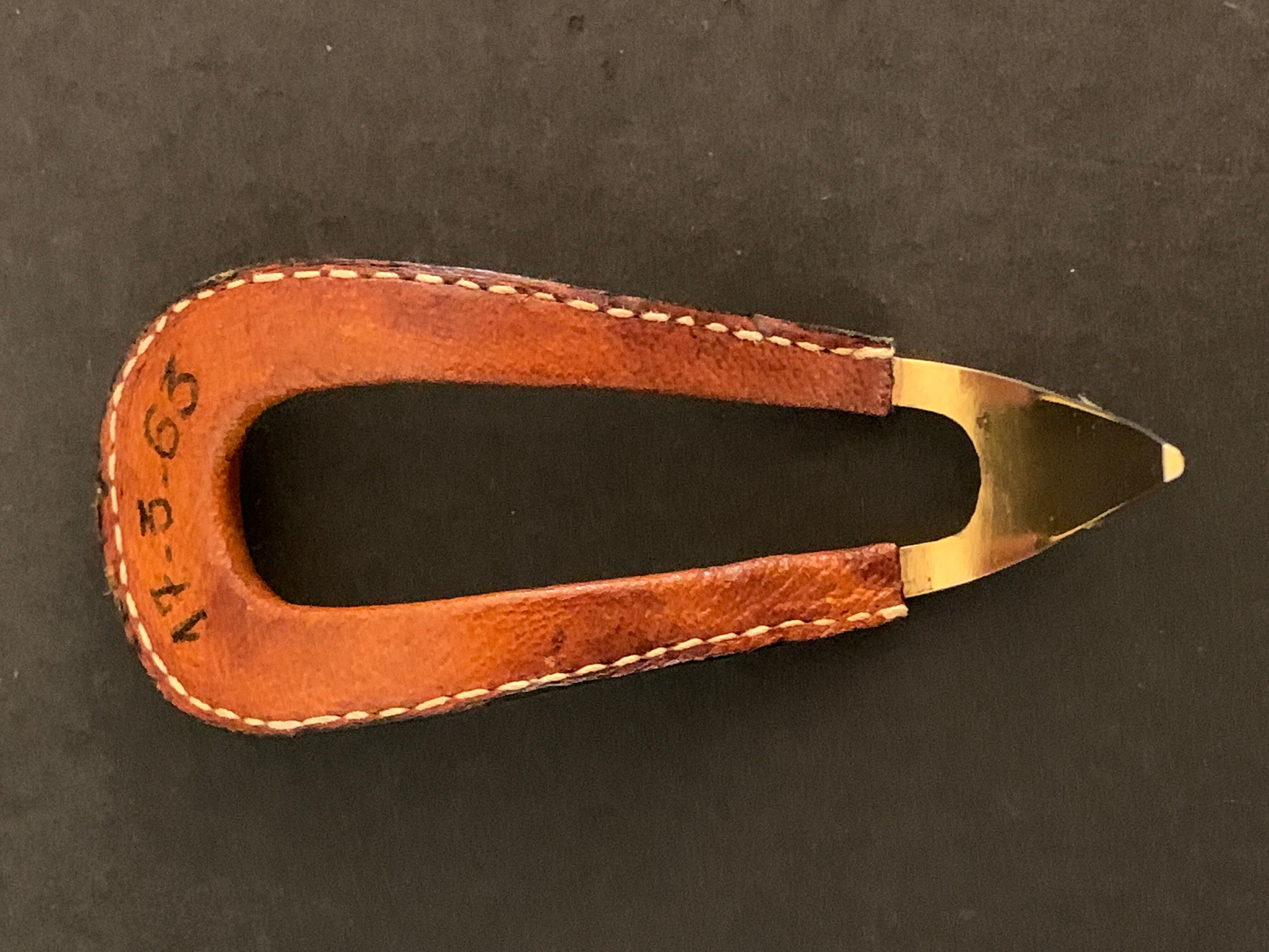 Carl Auböck pipe rack in leather and bronze, 1963