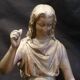 Statuette of a woman in gilded cast iron (Joan of Arc?)