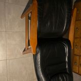 Scandinavian armchair and footrest in teak and leather 1960