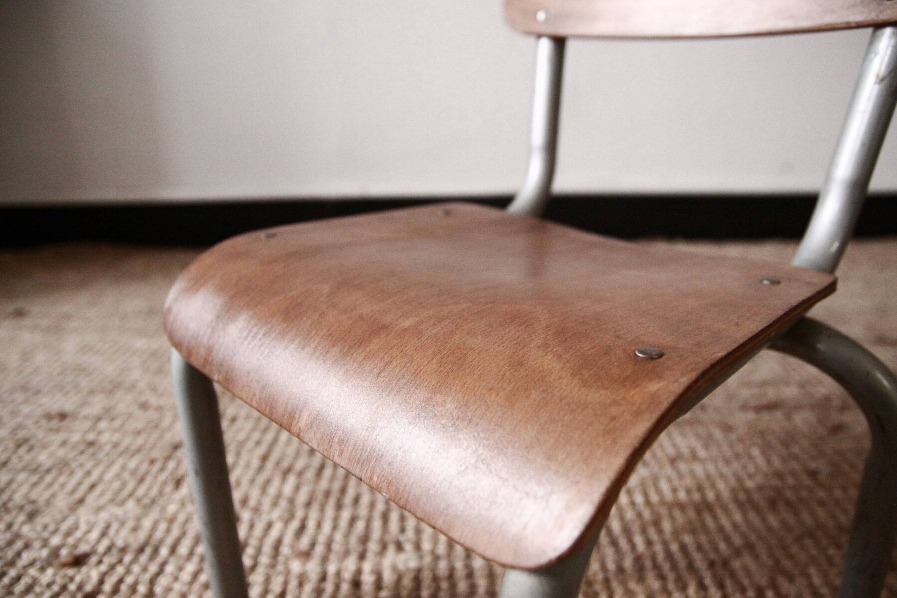 Old school chair in wood and metal