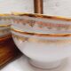 Trio de bols en porcelaine blanc et or
