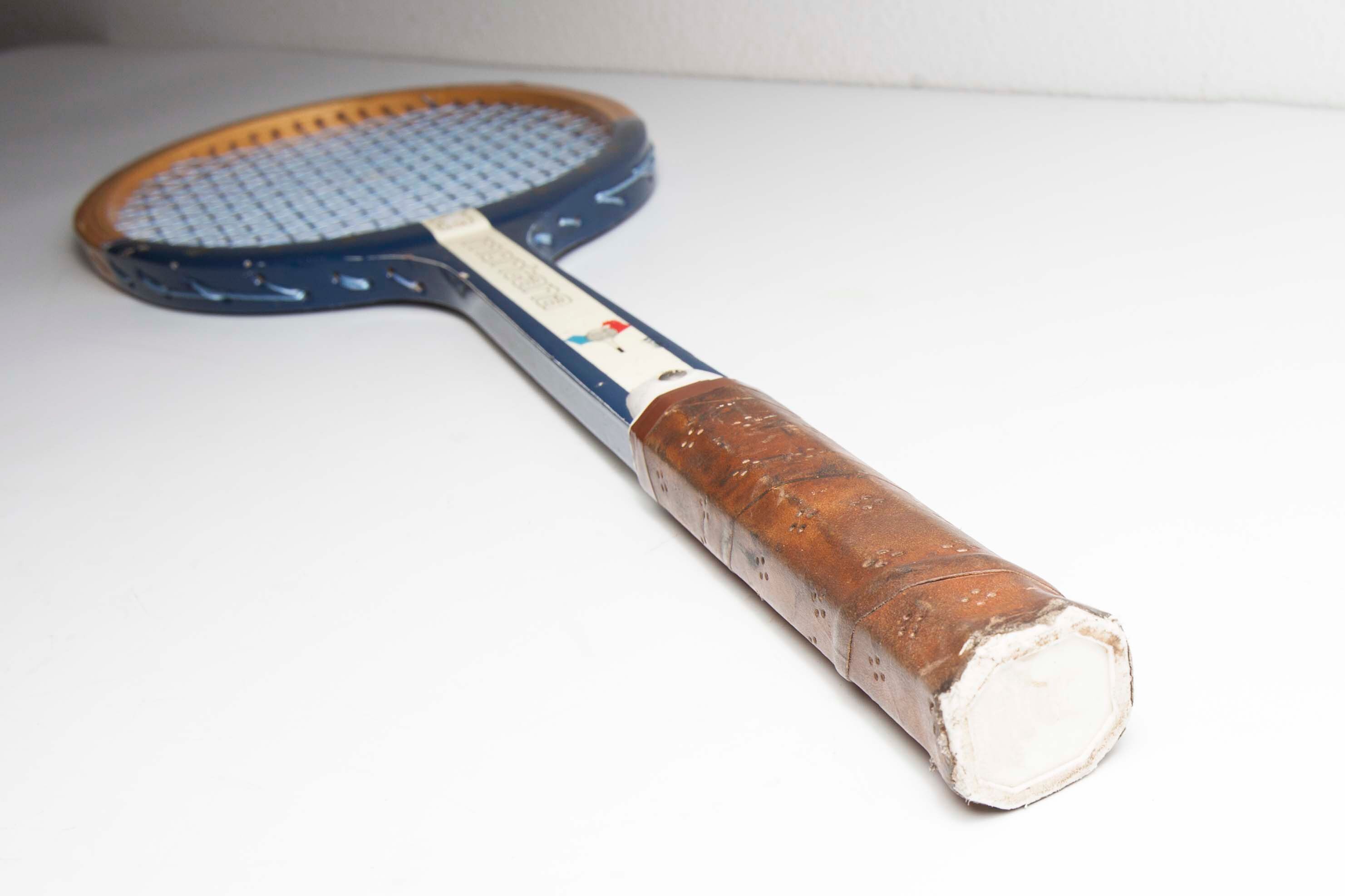 Blue Montana M505 racket with leather bag