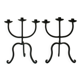 Pair of wrought iron candlesticks in the style of the Artisans of Marolles.
