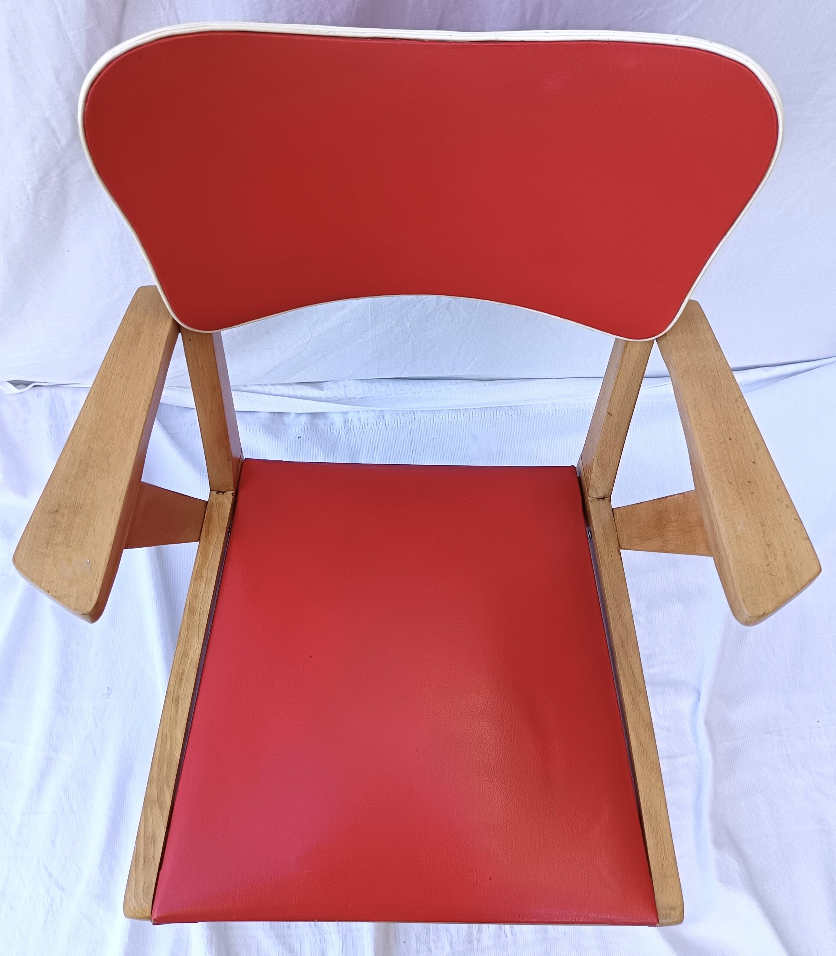 1960s wooden chair with armrests and faux leather seat