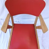 1960s wooden chair with armrests and faux leather seat