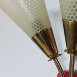 Vintage wall lamp from the 1950s in brass with flower decoration.