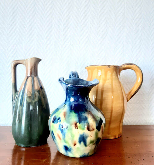 Set of art nouveau ceramic pitchers