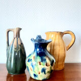 Set of art nouveau ceramic pitchers