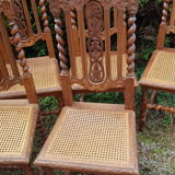 Carved antique chairs with rattan seat