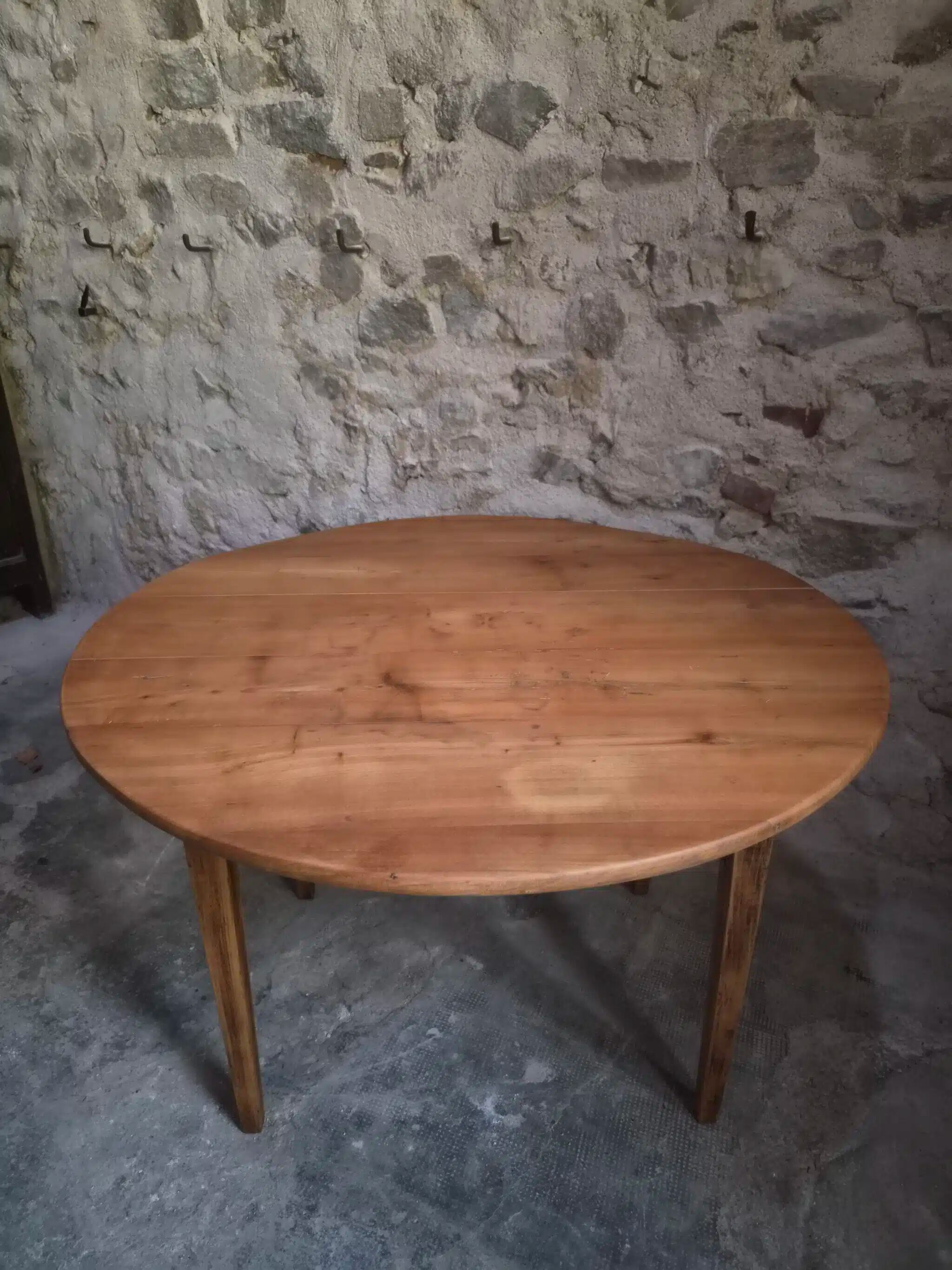 Rustic French antique dining table, drop-leaf table in cherry wood, circa 1900.