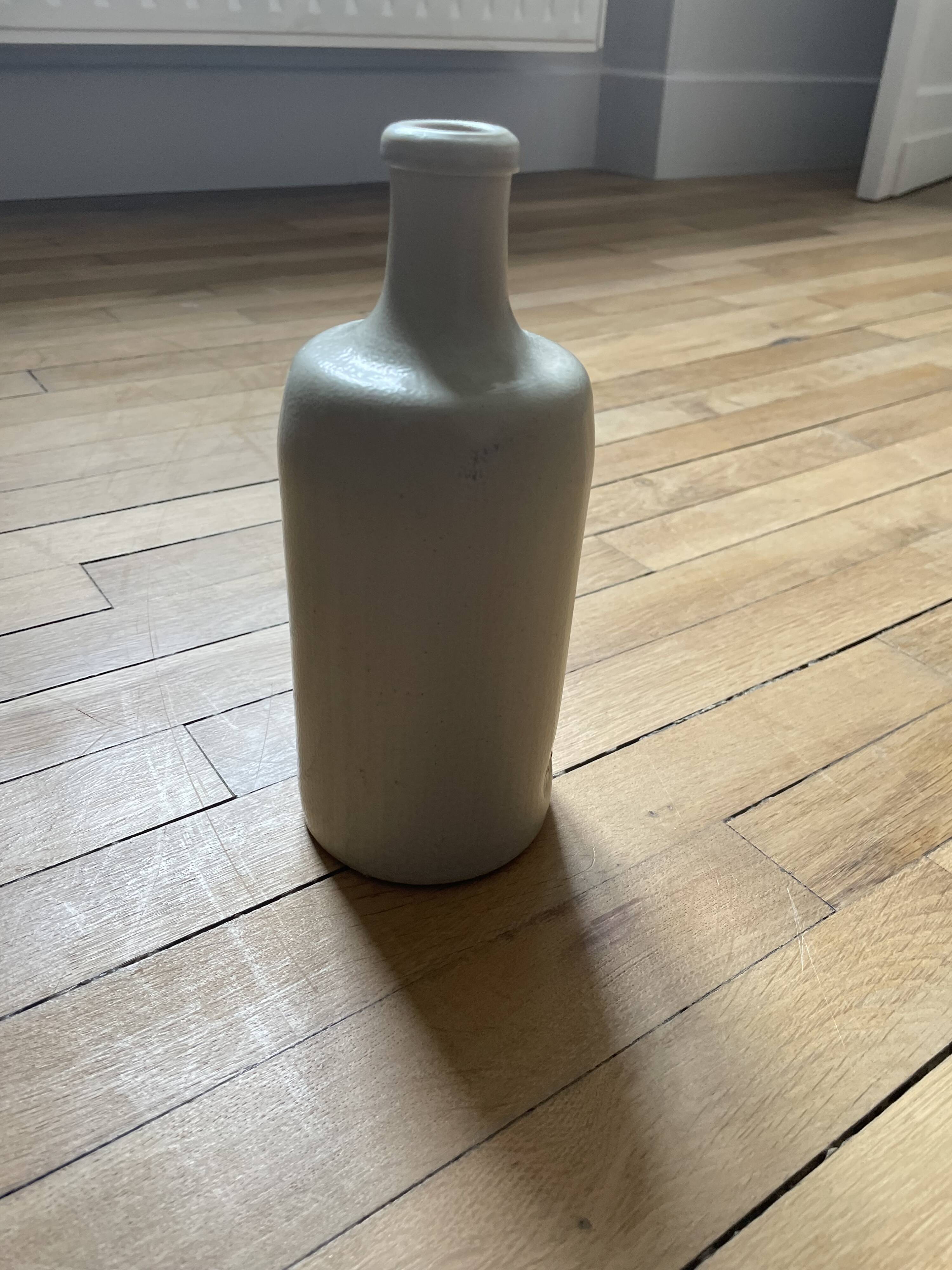 Vintage stoneware bottle 250914