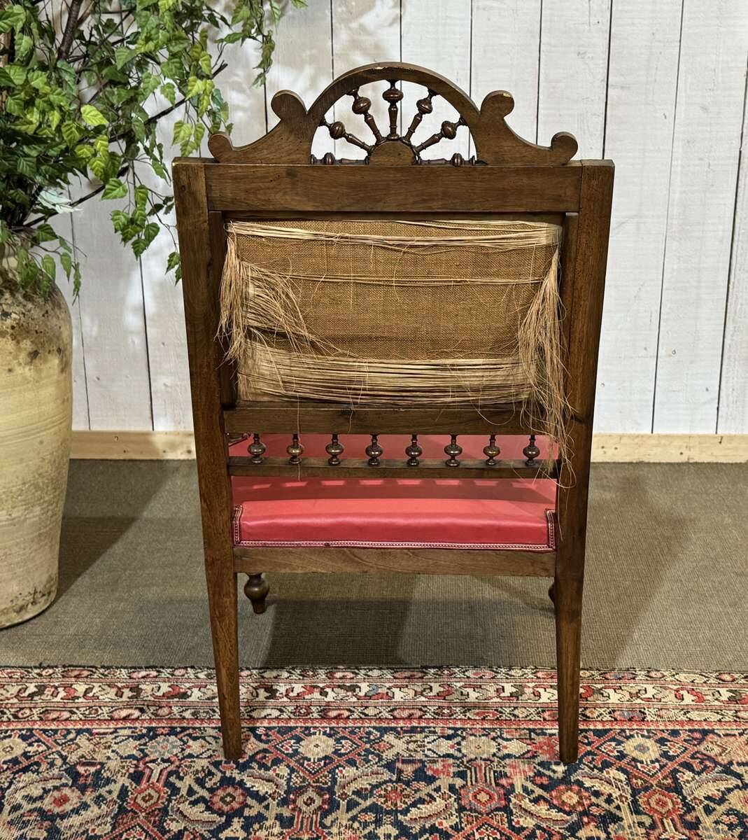 Breton armchair and its footrest from the 1930s.