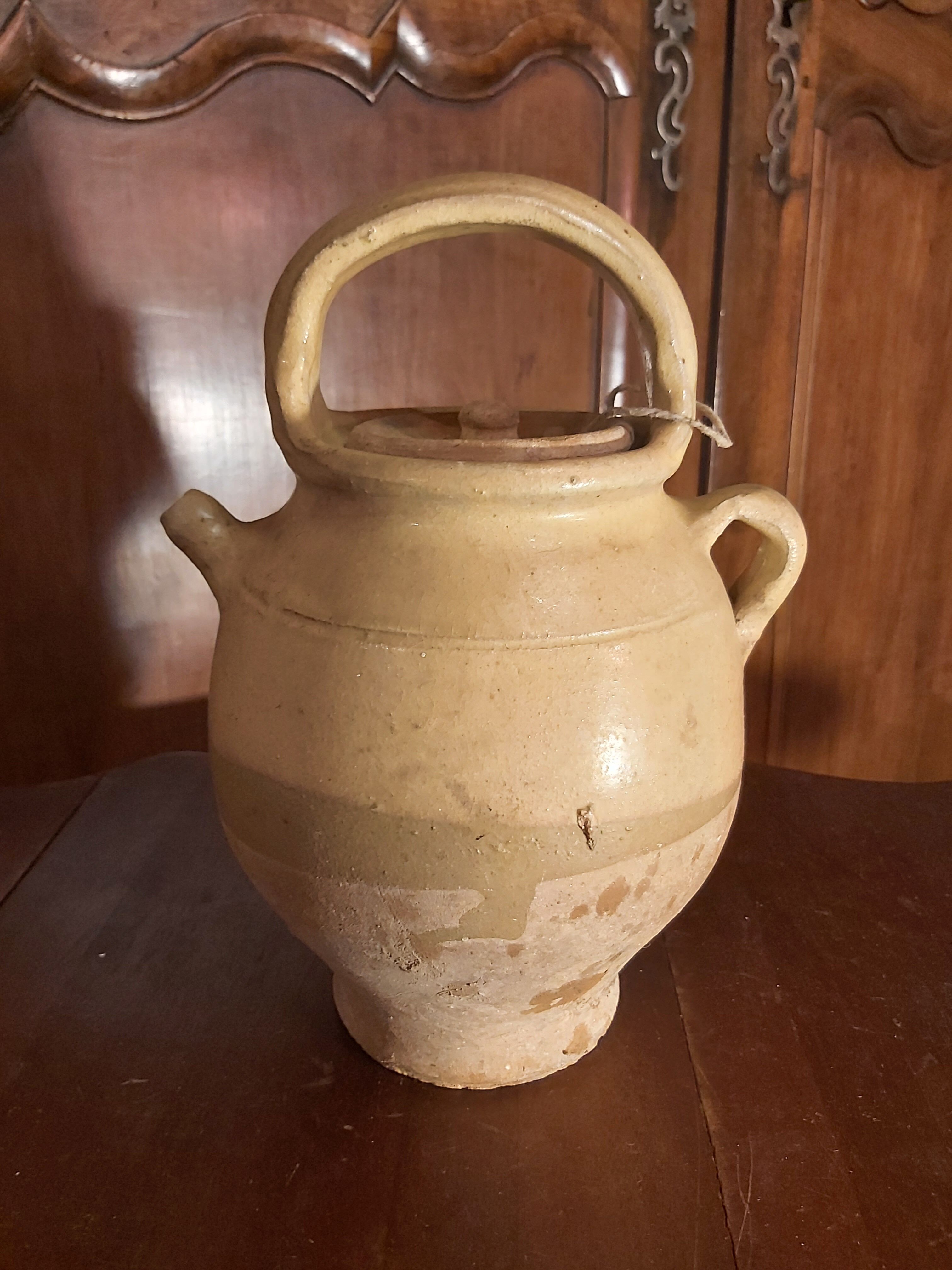 Old glazed terracotta gargoulette