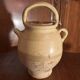 Old glazed terracotta gargoulette