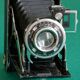 Vintage bellows camera with leather case