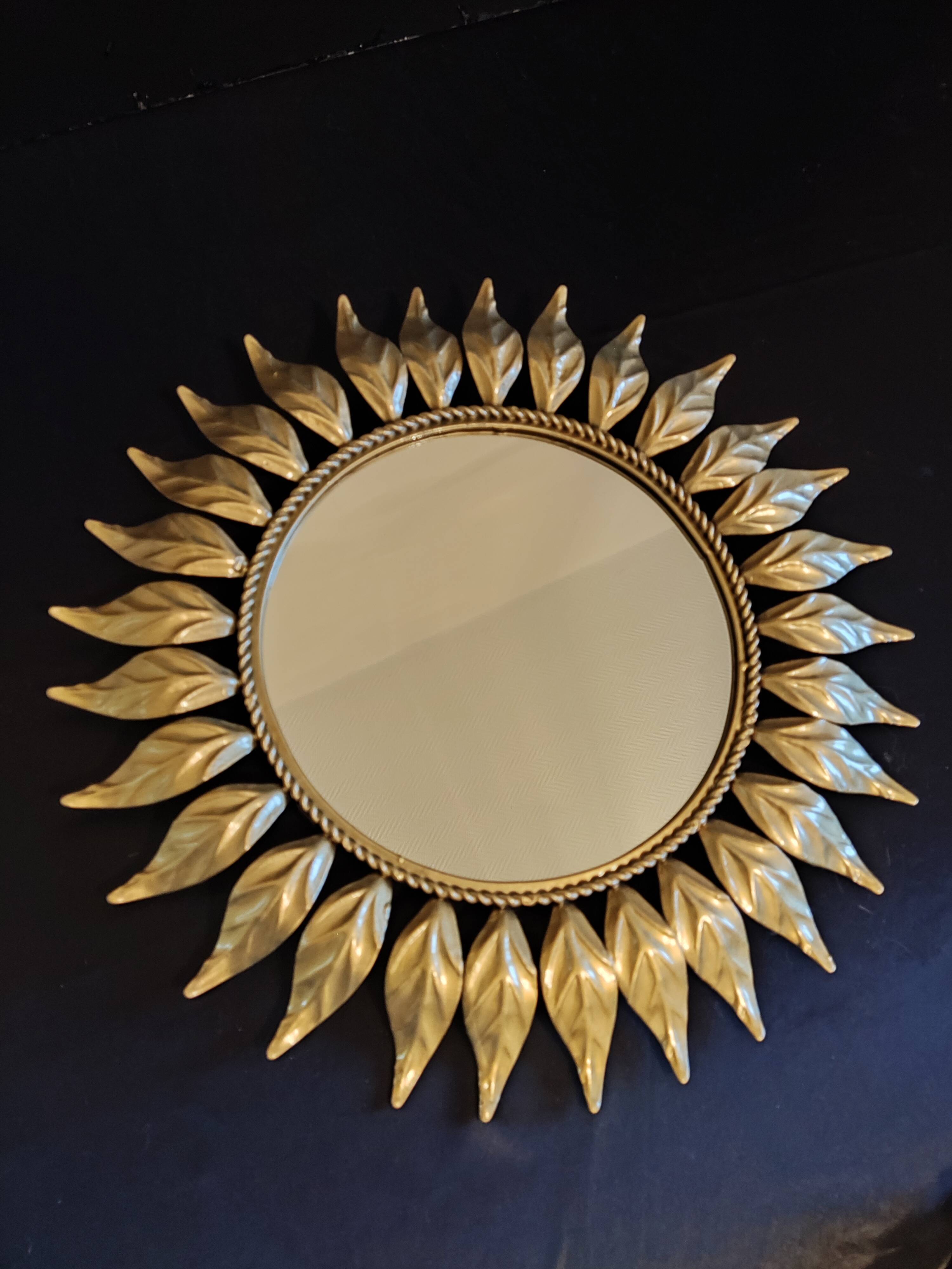 Miroir soleil en métal doré