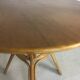 Wooden table and round rattan