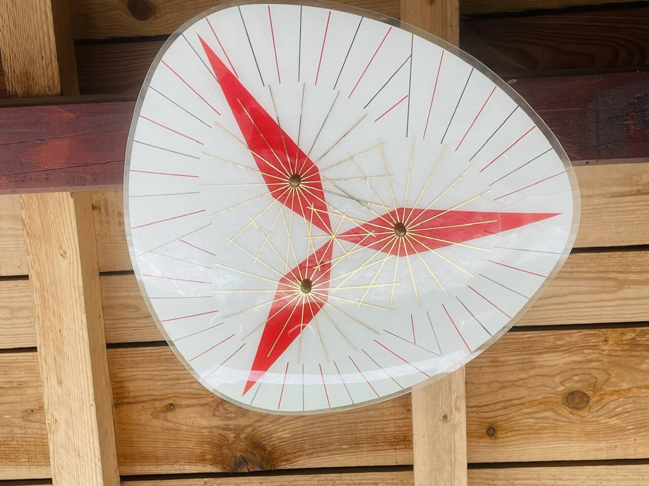 Vintage triangular ceiling light in glass and brass circa 1970s.