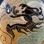 Very large dragon lamp on a yellow background in well-fired Vietnamese stoneware.