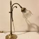 Brass table lamp with a glass shade