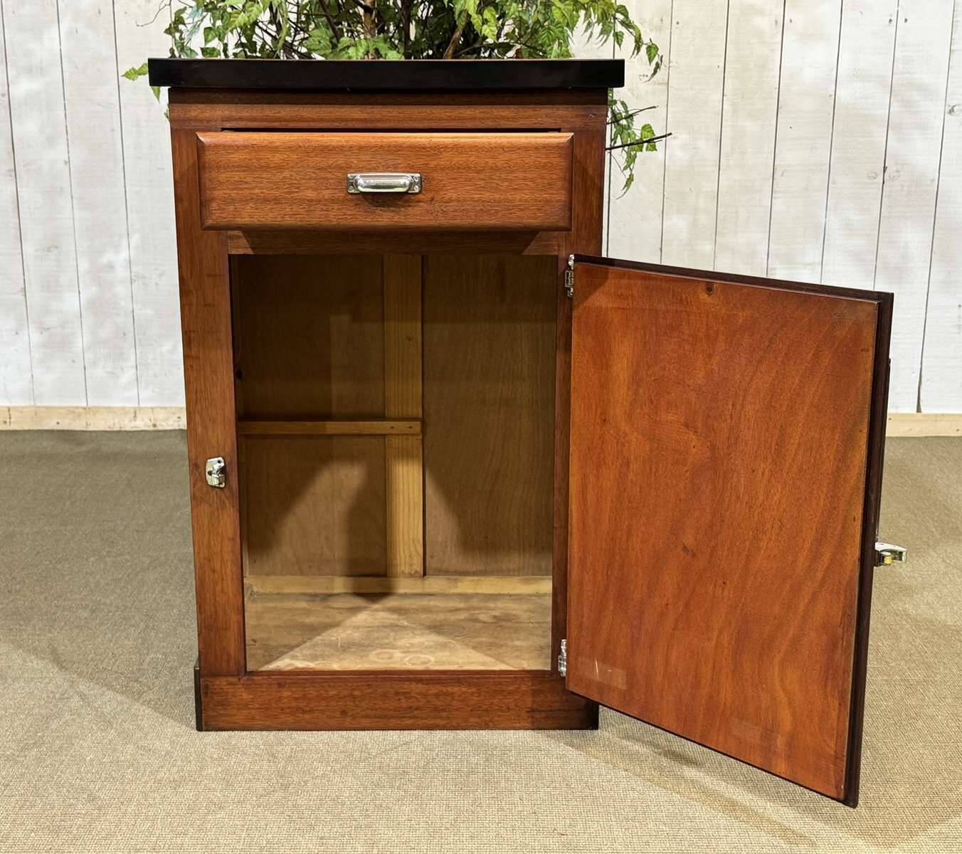 Bistro sideboard with 1 mahogany door and Formica top from the 1950s.