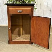 Bistro sideboard with 1 mahogany door and Formica top from the 1950s.