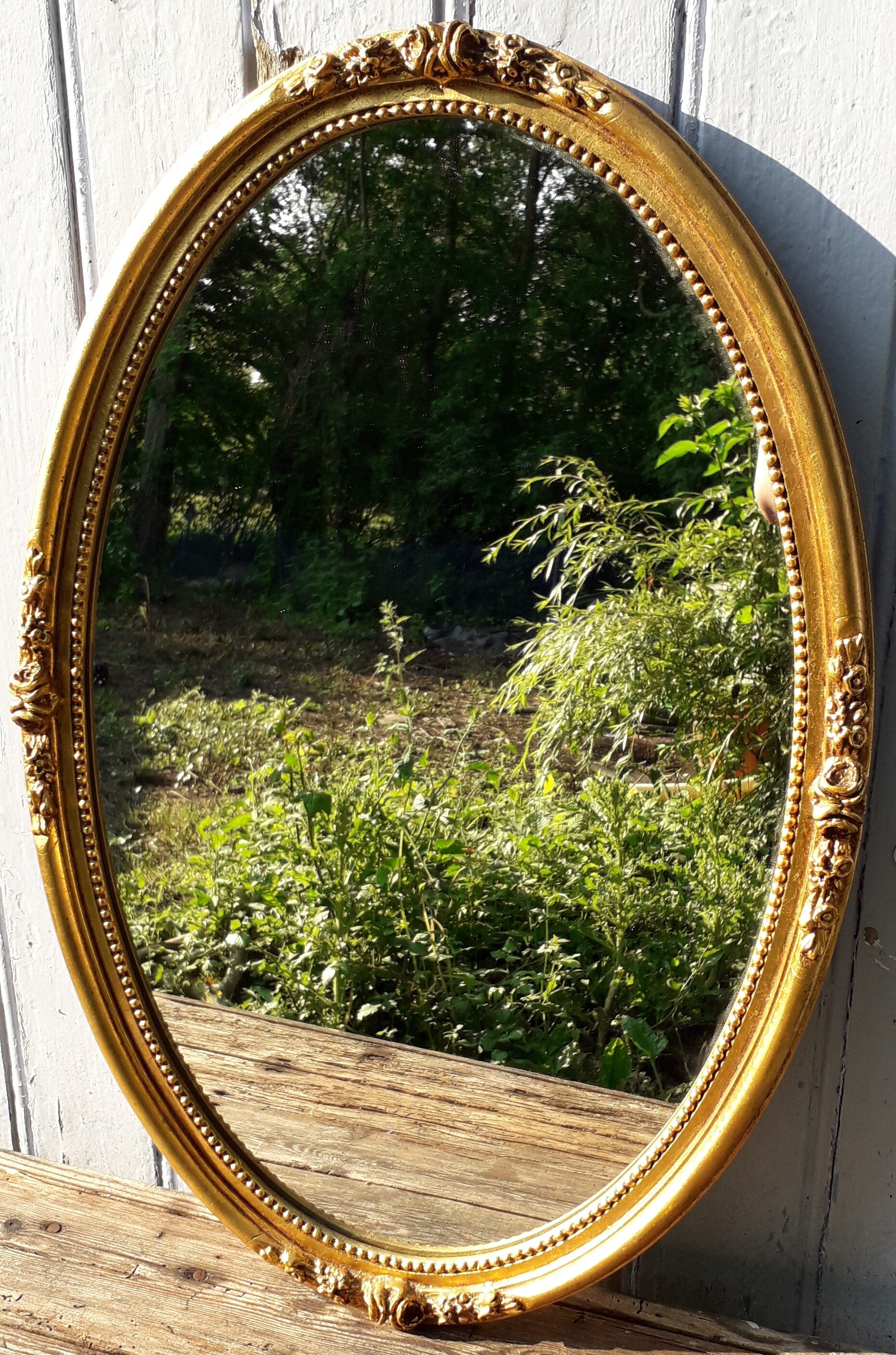 Gilded platter mirror 45x66cm