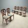 Antique walnut chairs with curved legs, Italy, mid-19th century.