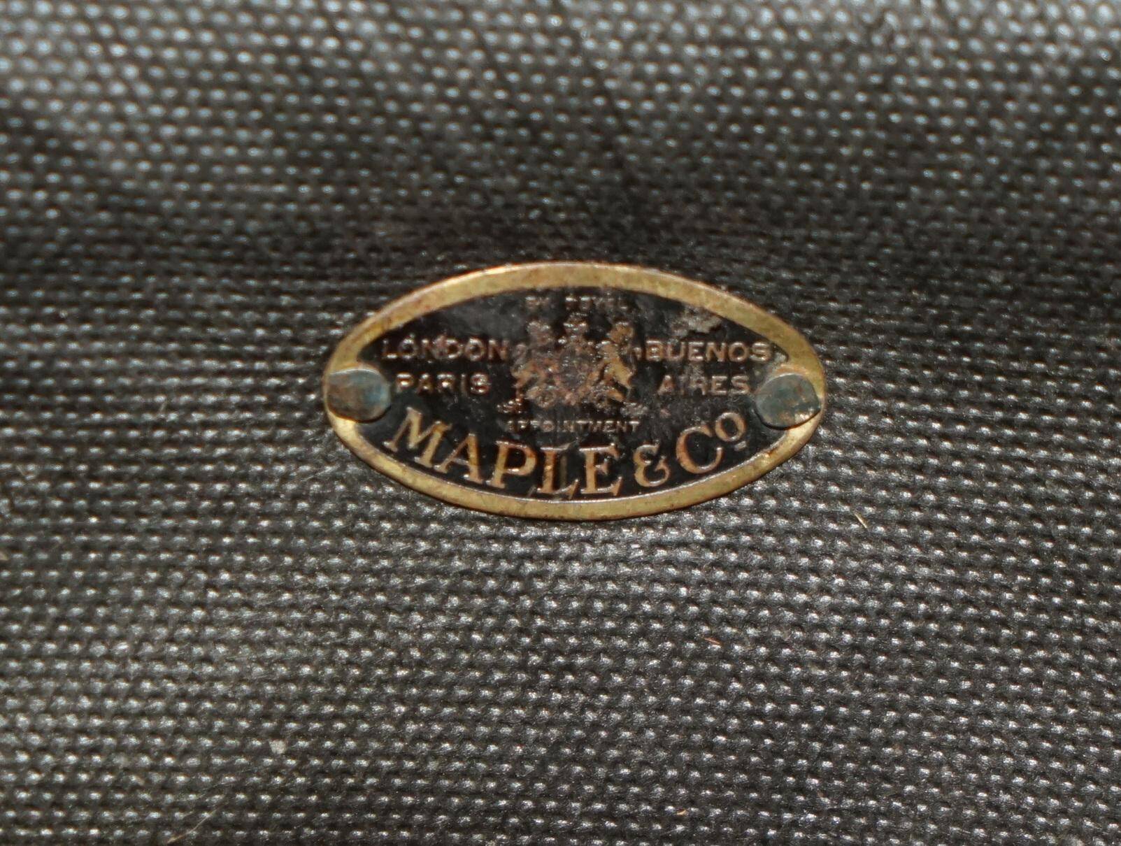 Victorian leather canapé, shield armrests, stamped Maple & Co.