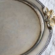 Vintage round silver metal serving tray with gold knot handles