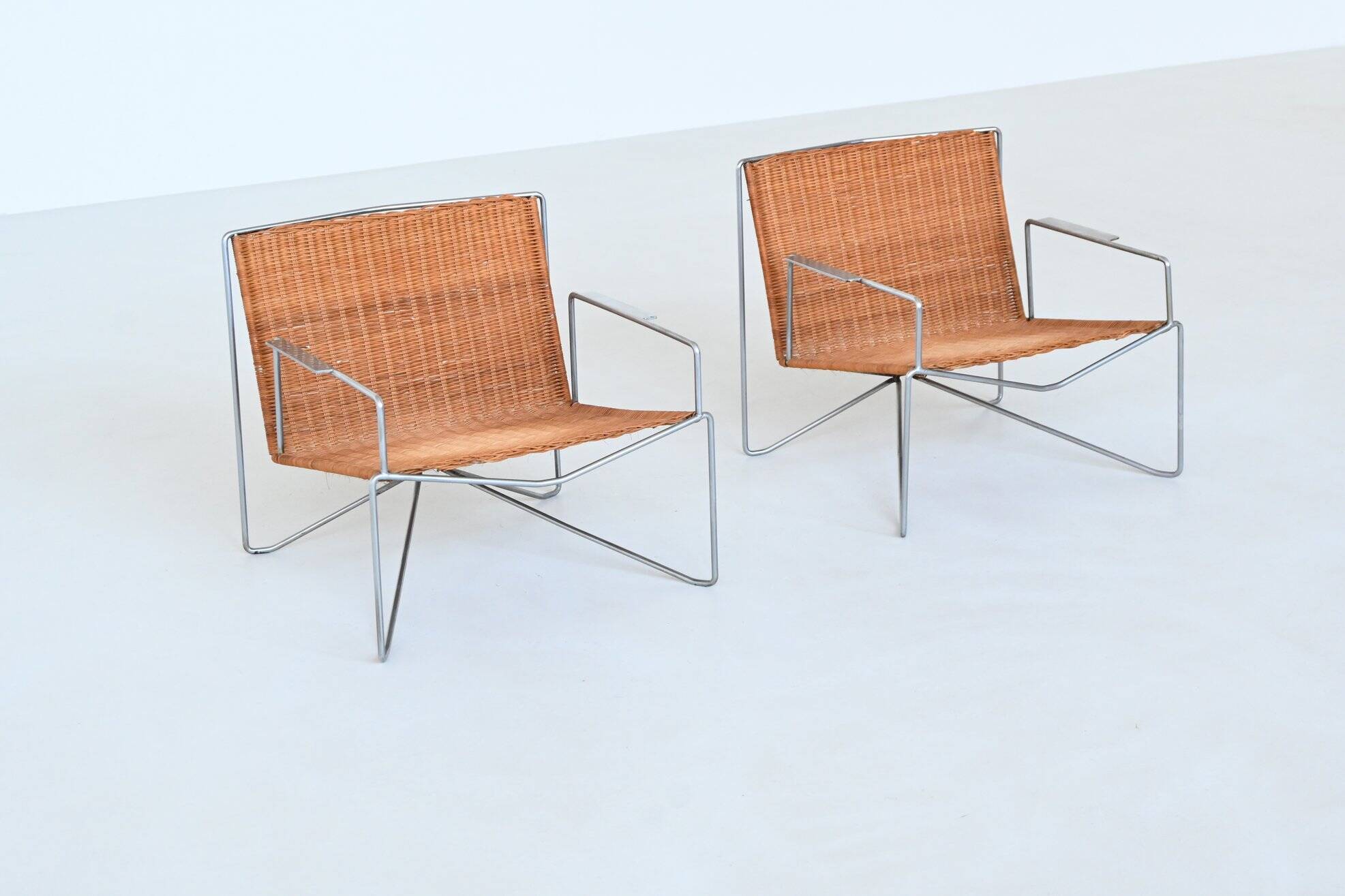 Pair of lounge chairs steel and rattan Gelderland The Netherlands 1964