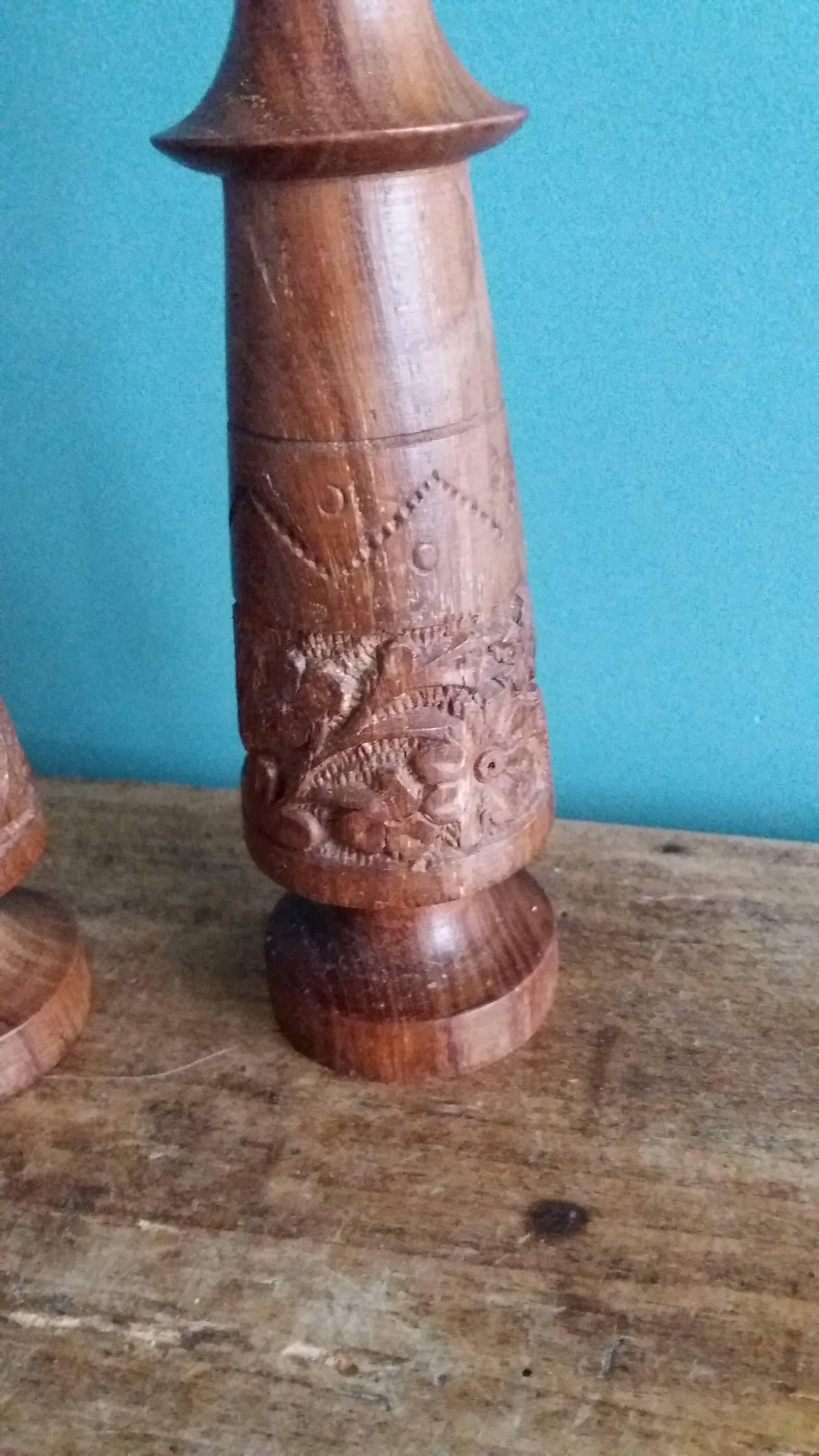 Bohemian candle holders made of turned and carved wood.