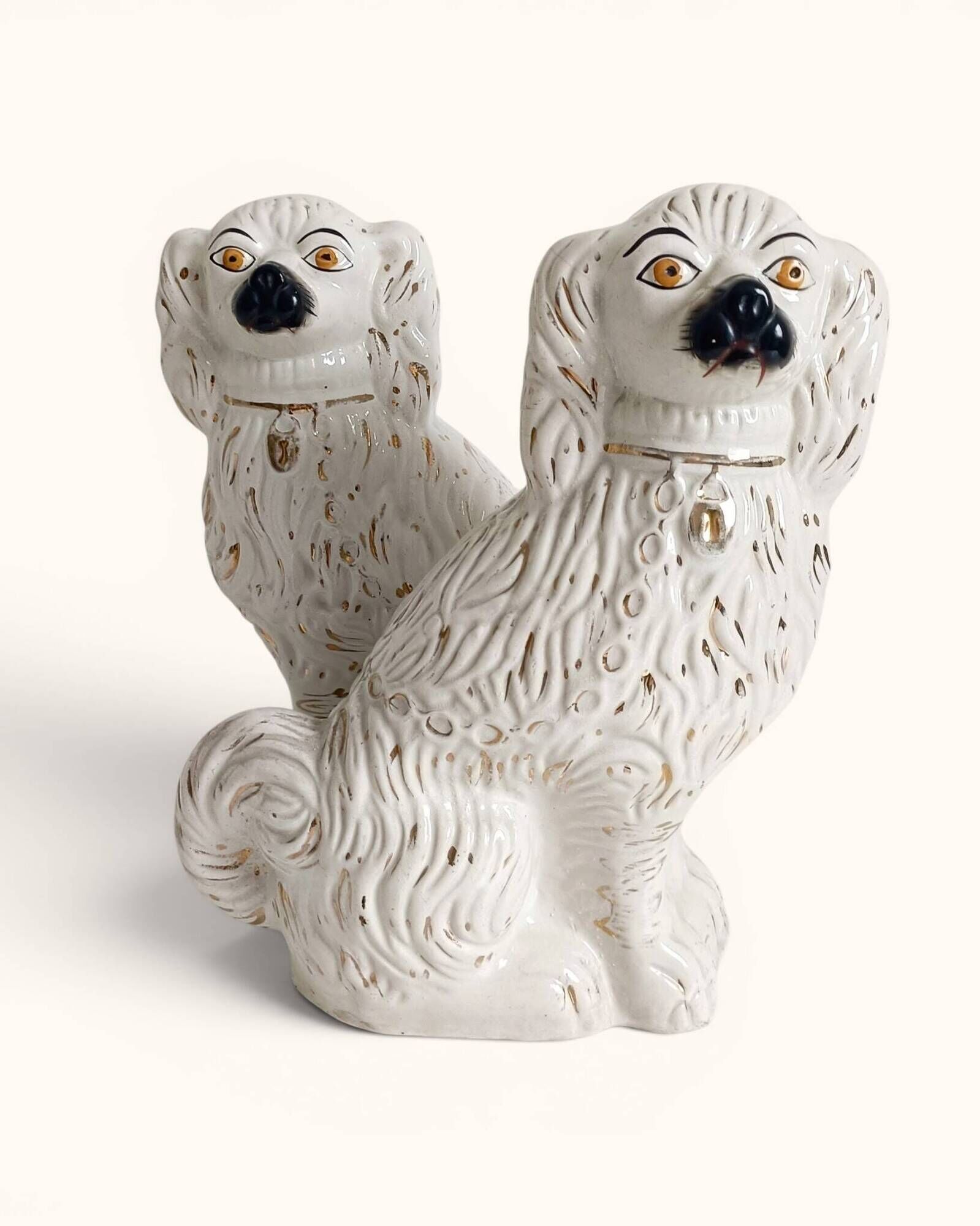 Pair of King Charles Spaniel dogs in Staffordshire majolica style.