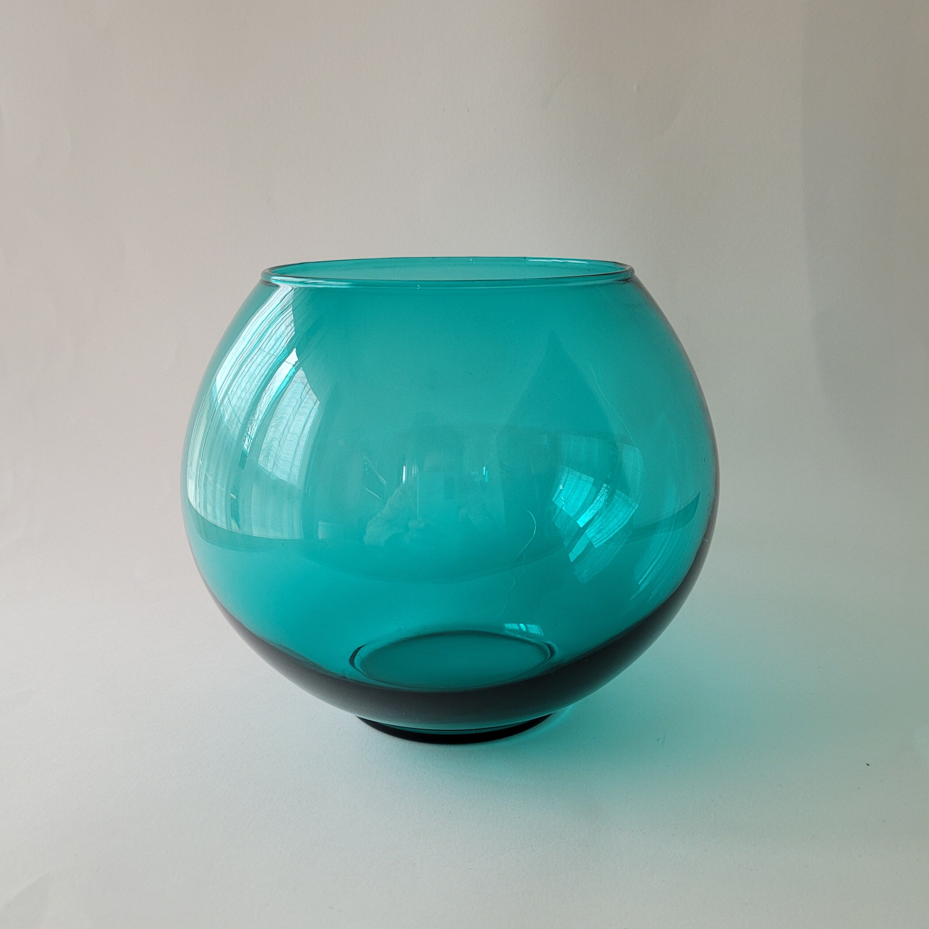 Round blue glass vase